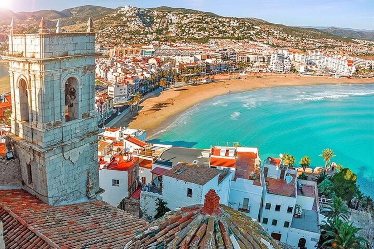 an aerial view of a city and a beach