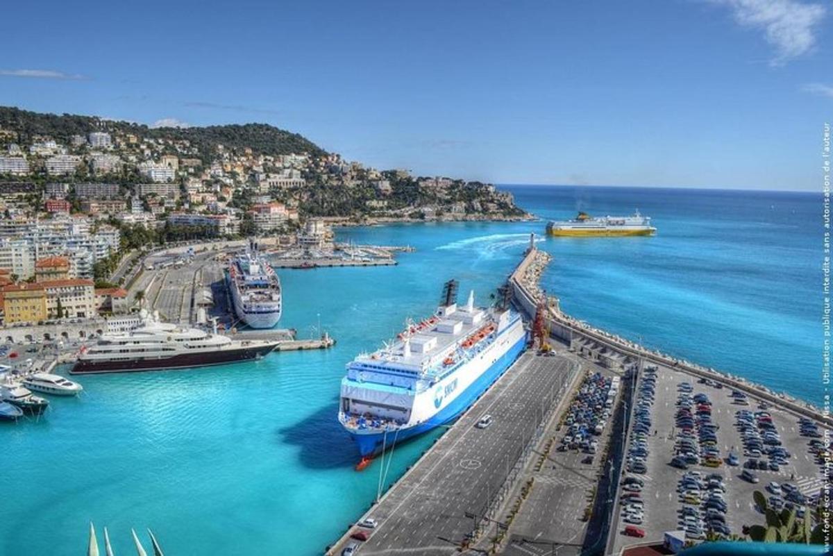 a cruise ship is docked in a harbor