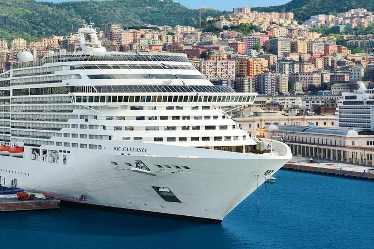a large cruise ship docked in a harbor