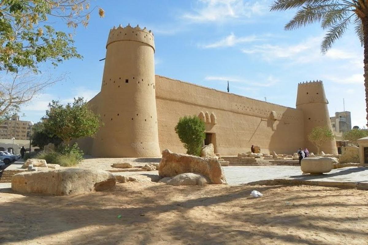 a building with two towers on top of it