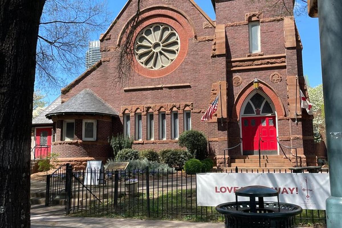 a church with a sign in front of it