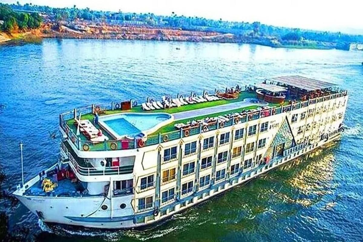 a cruise ship in the water with a pool