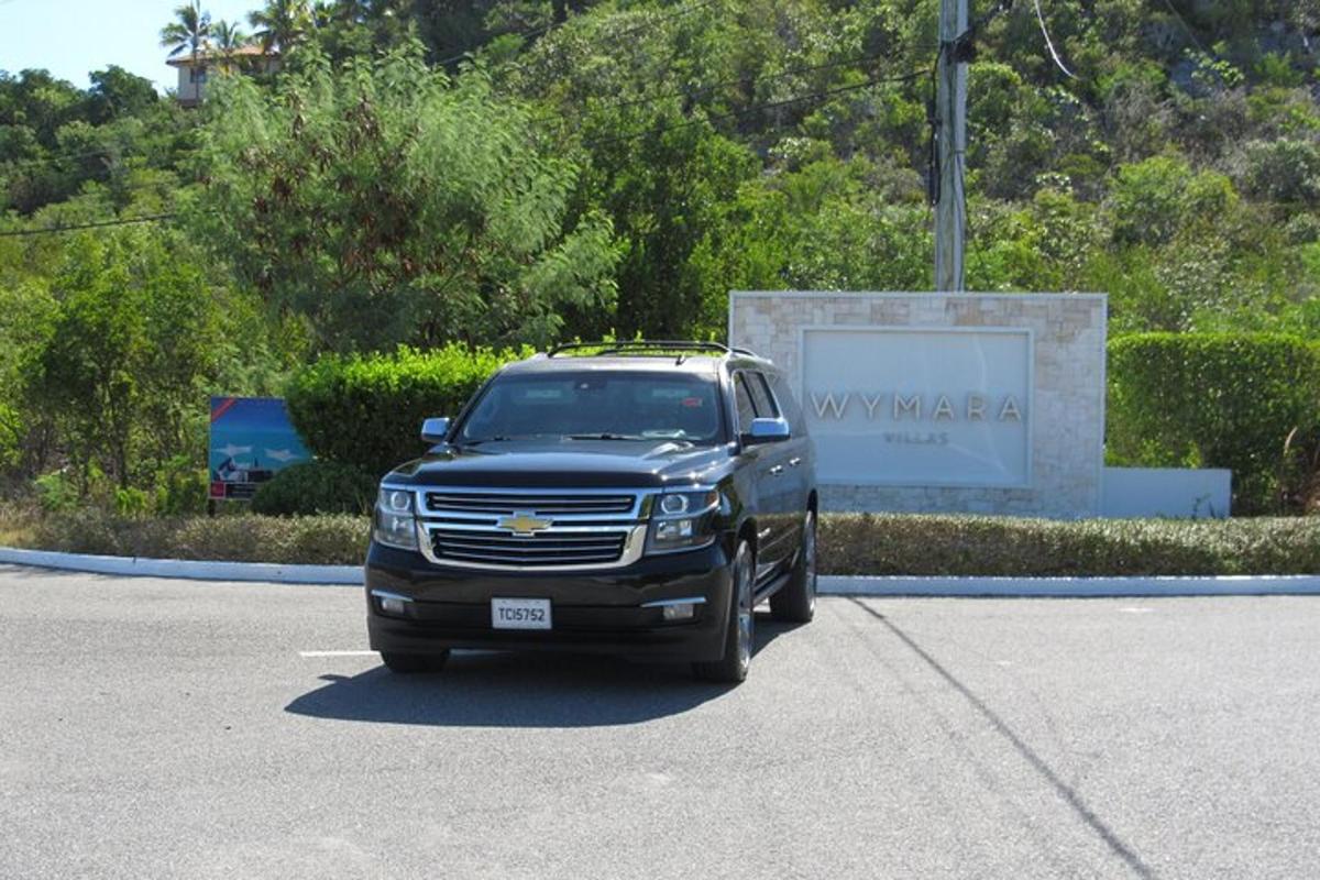 a black truck parked in a parking lot