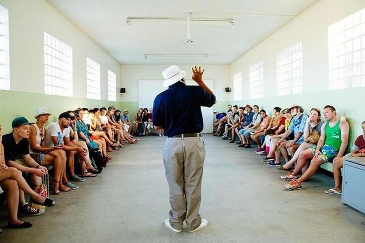 a man standing in front of a crowd of people