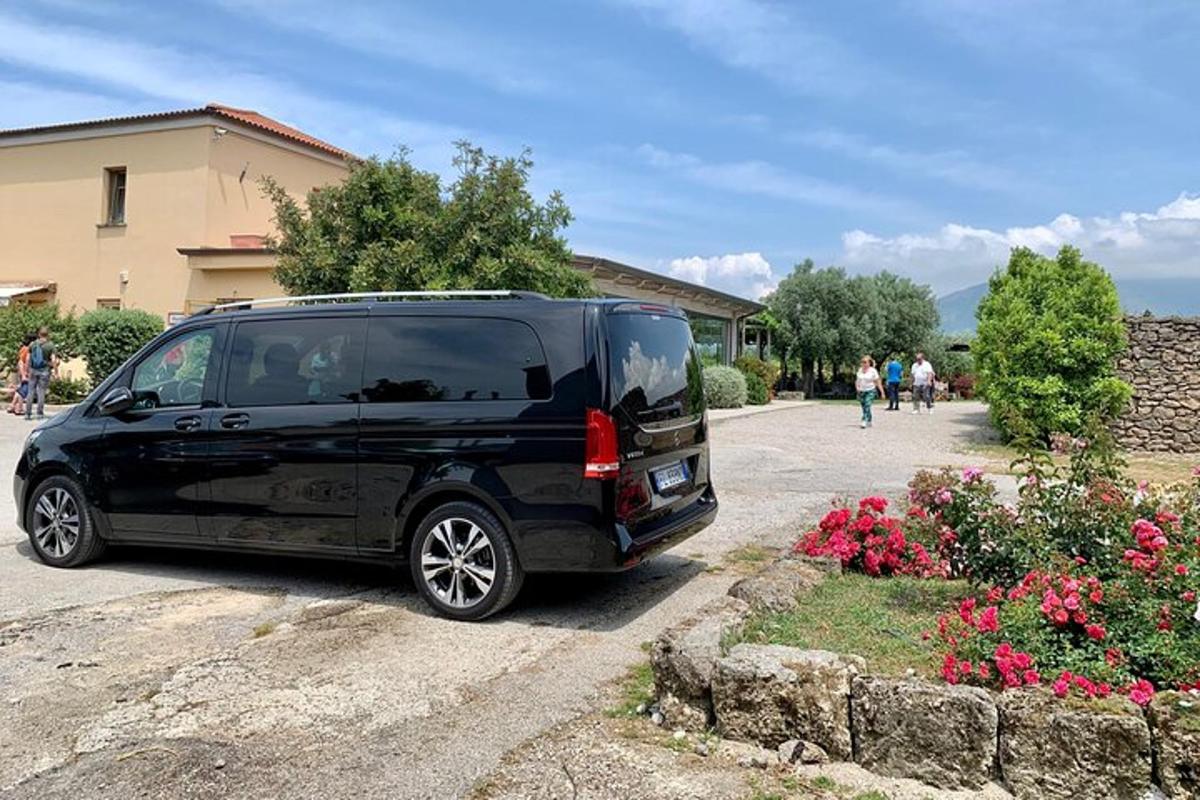 a black van parked in a parking lot