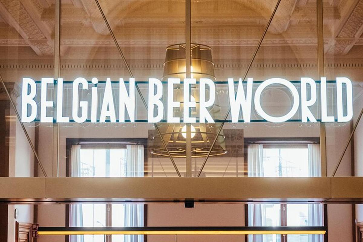 a sign that reads belgian beer world hanging from a ceiling