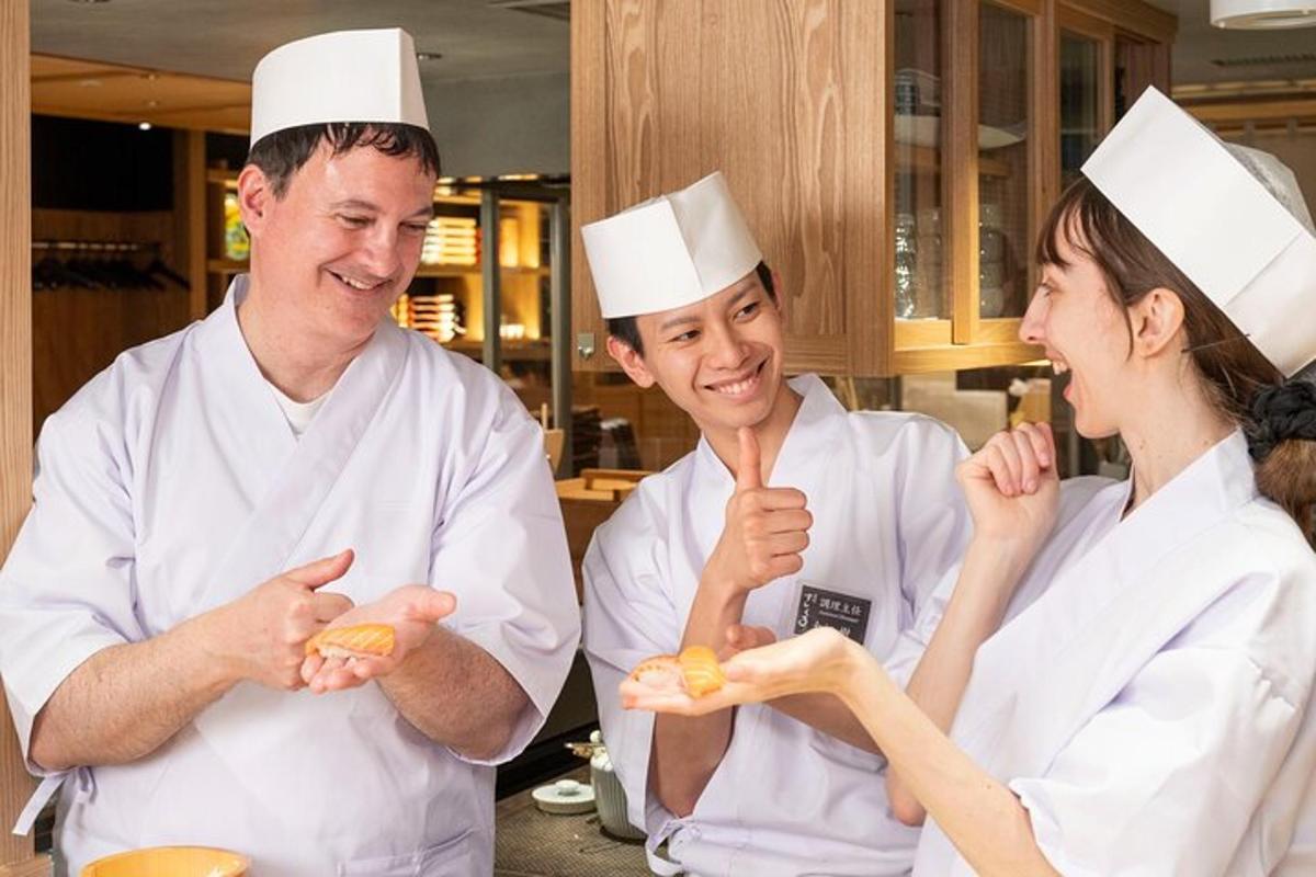 a group of three chefs standing in a kitchen preparing food