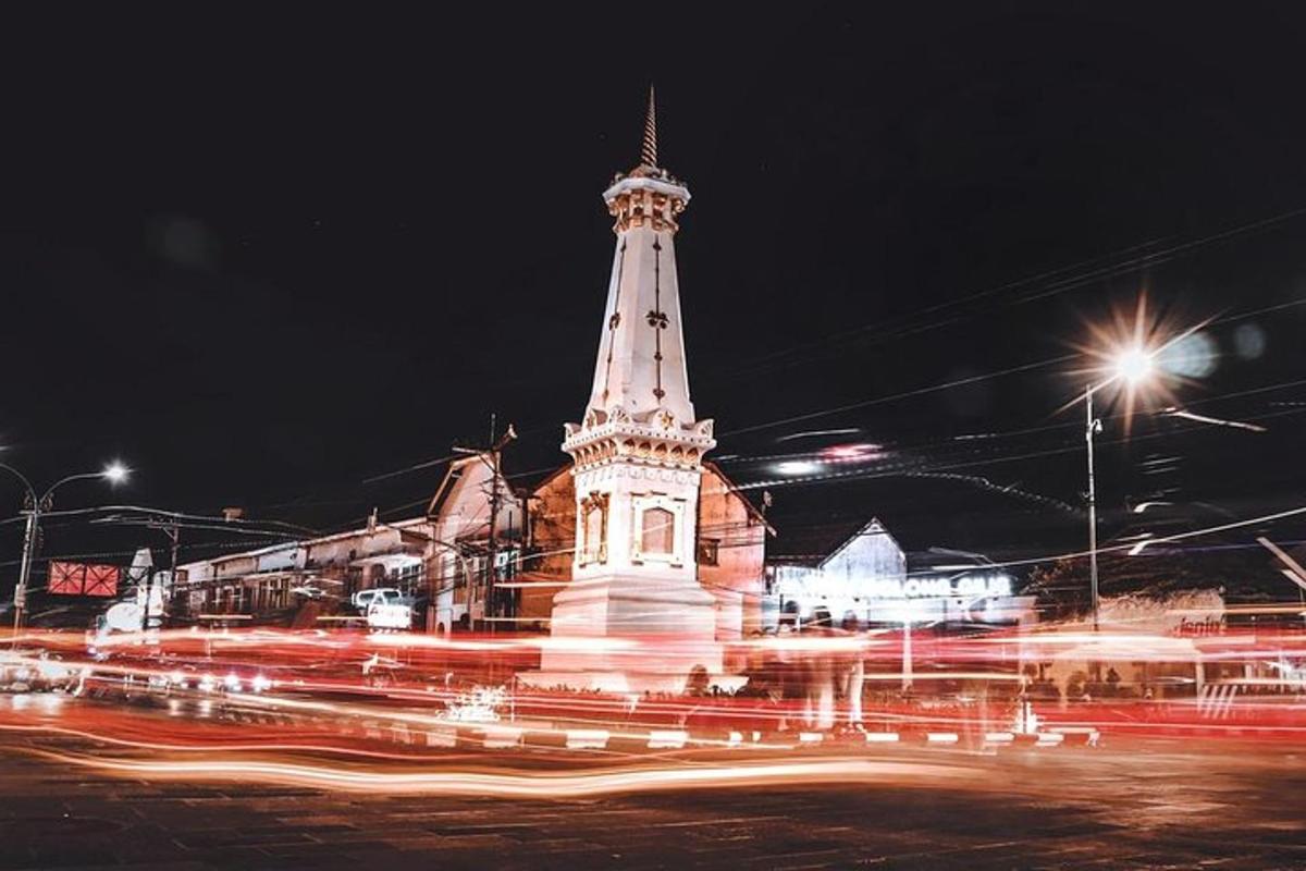 a building with a clock tower at night