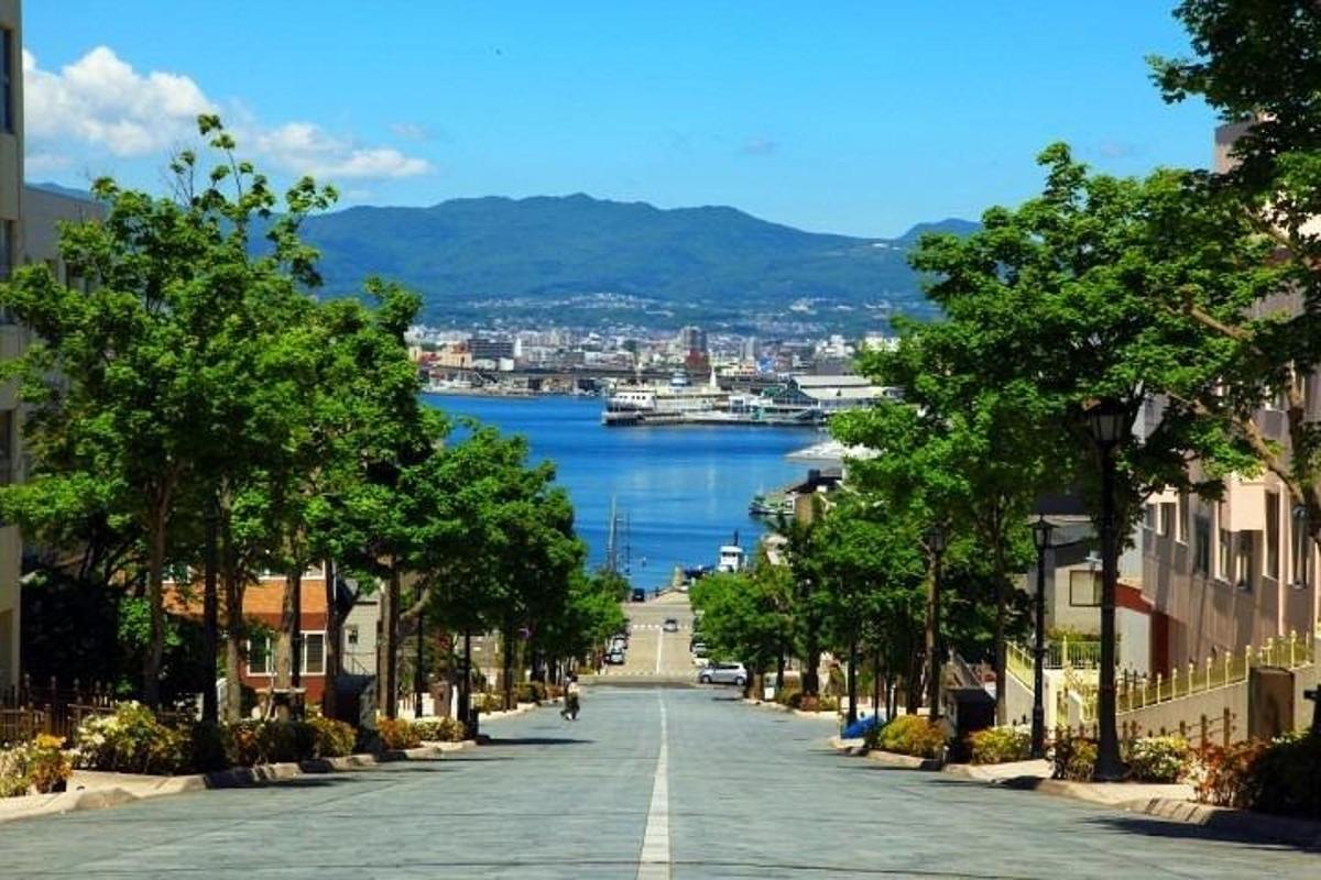 a street in a city with a view of a body of water