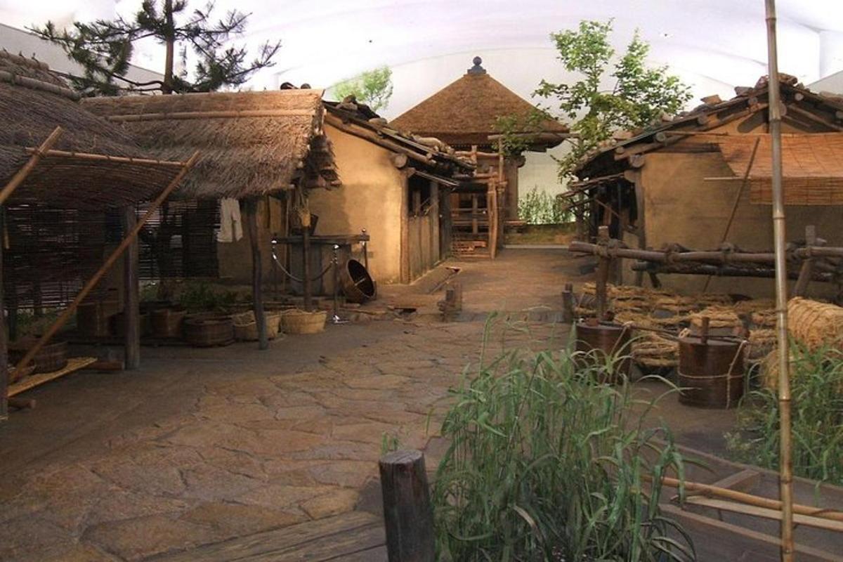 an outside view of an old house with a courtyard