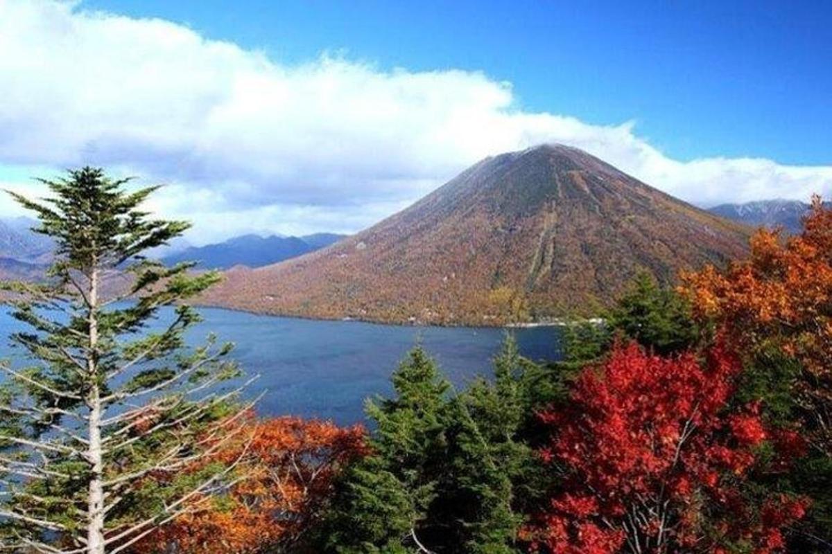 a mountain with a lake in front of it