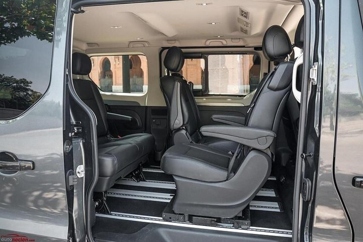an open back seat of a van with the back seatsktop