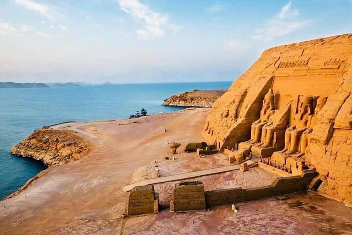ancient ruins on a cliff next to the ocean