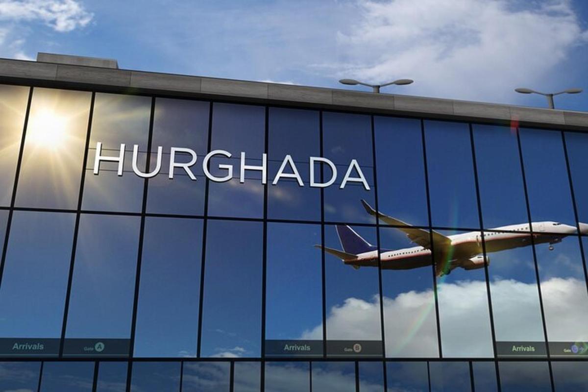 un aereo vola riflesso nelle finestre di un edificio hirafaga