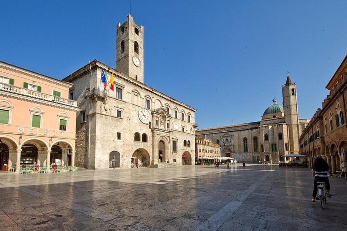 a building with a clock tower in a courtyard
