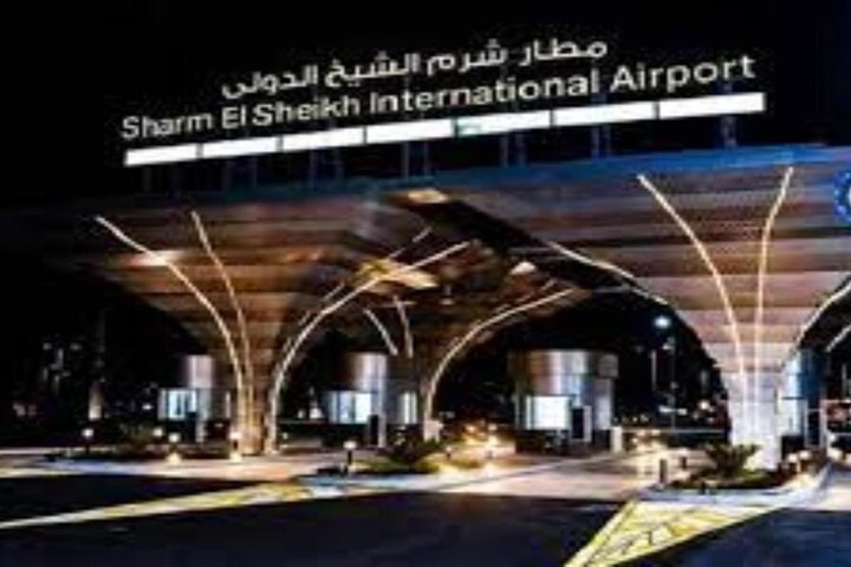 a bridge with a sign that reads istg shimov international airport