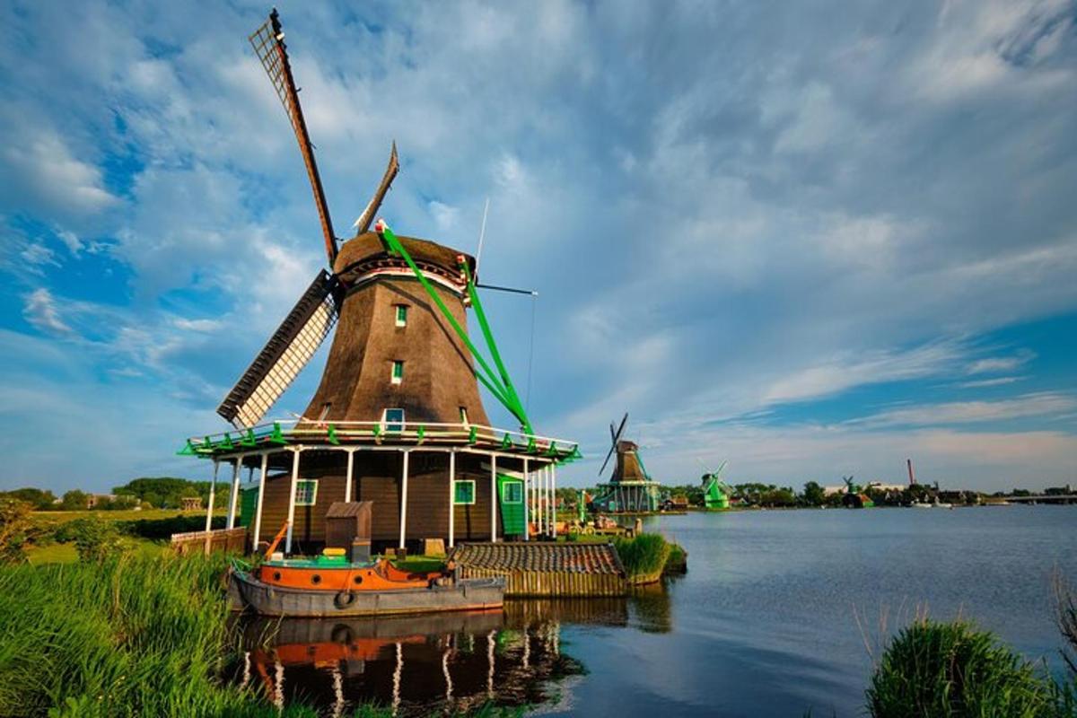 a windmill in the middle of a body of water