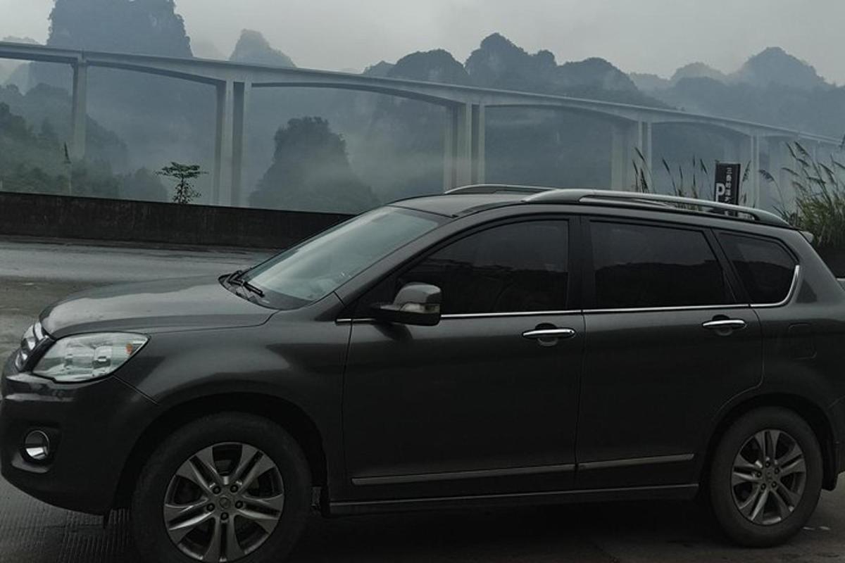 a black suv parked in a parking lot
