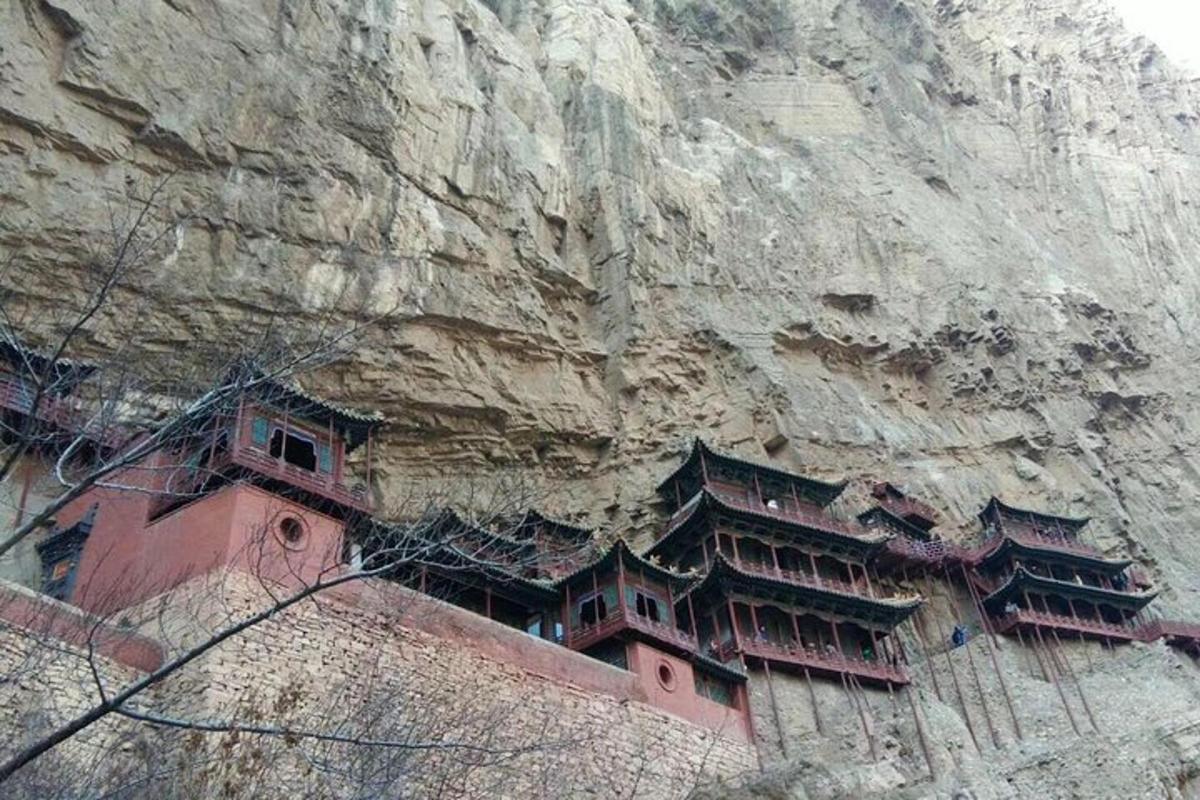 a building on the side of a mountain