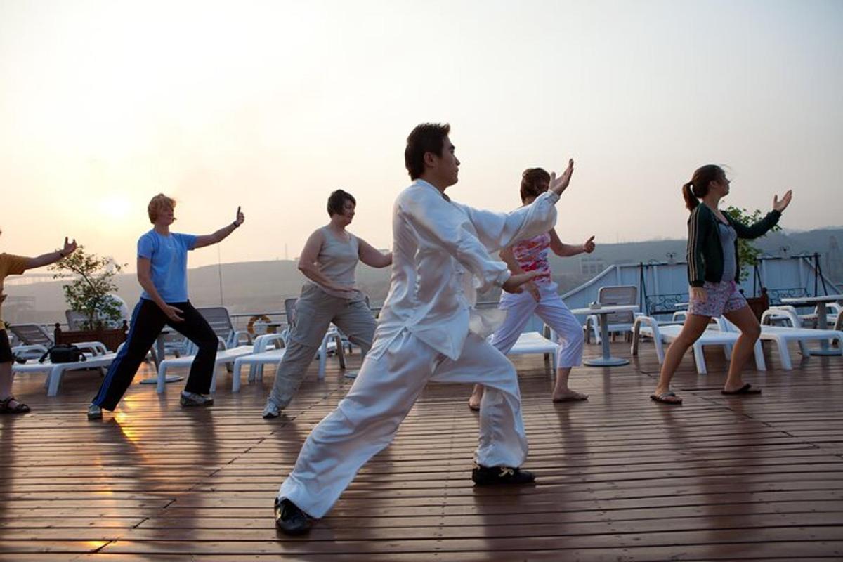 a group of people dancing on a deck