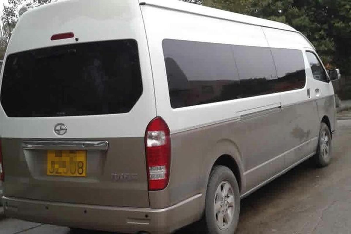 a white van parked on the side of a road