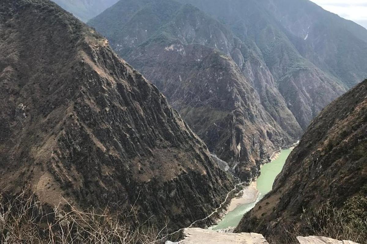 a mountain view of a river in a canyon