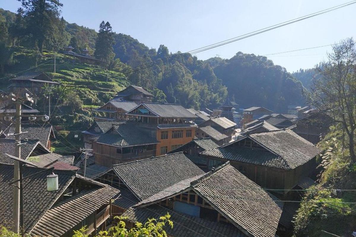 a group of roofs of houses on a mountain