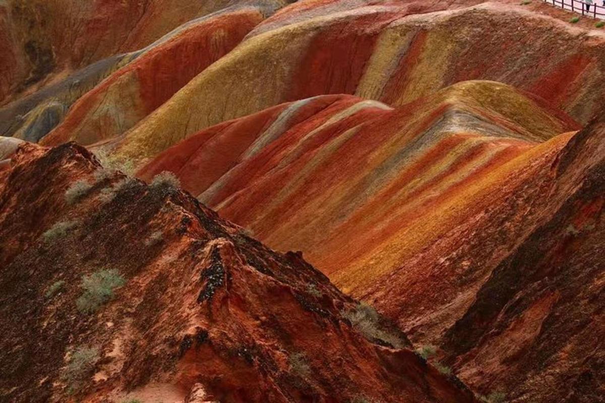 a painting of a canyon with red rocks