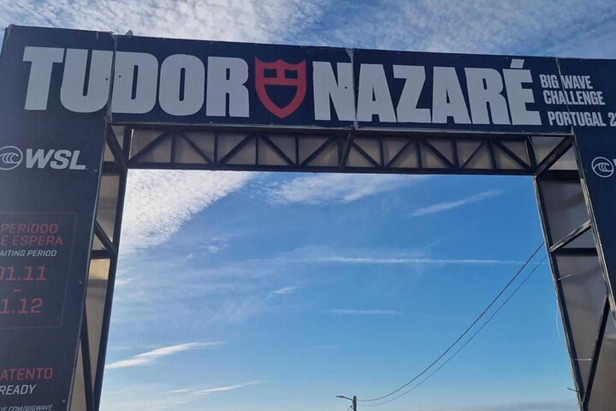 a sign that says tudor nazario on a bridge