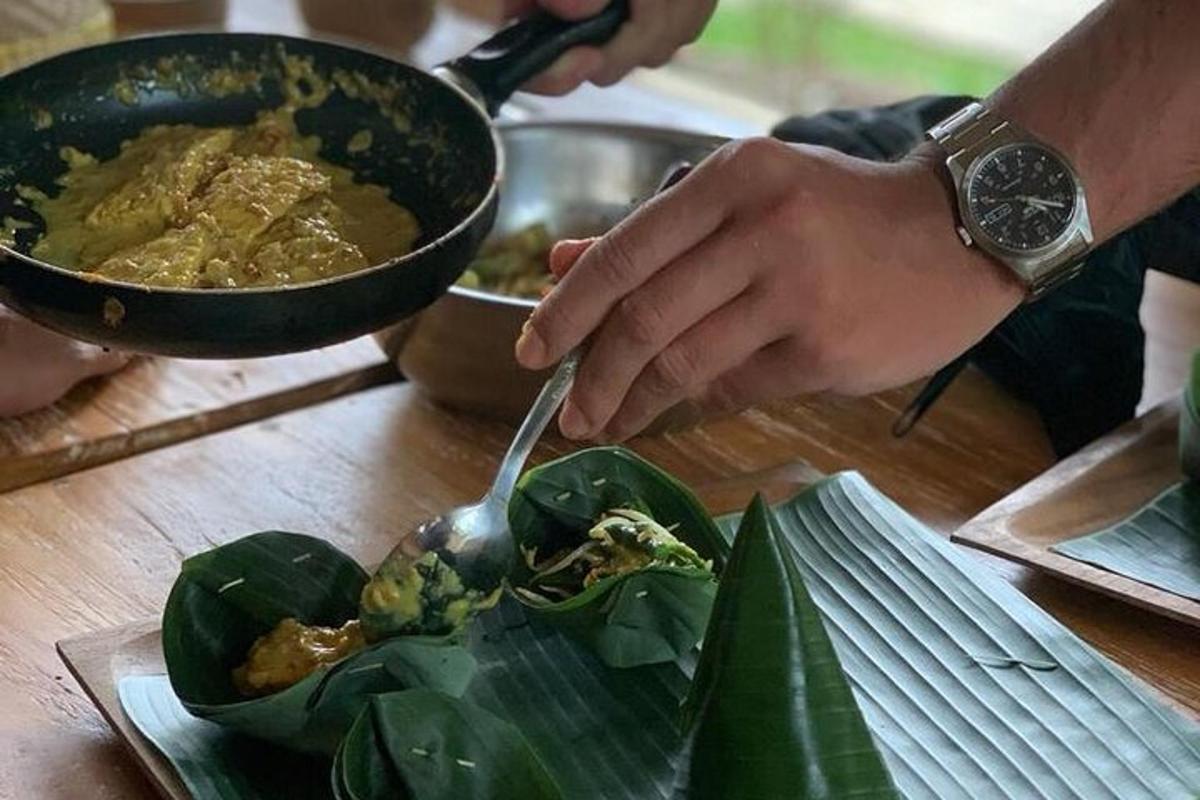 a person with a spoon and a bowl of food