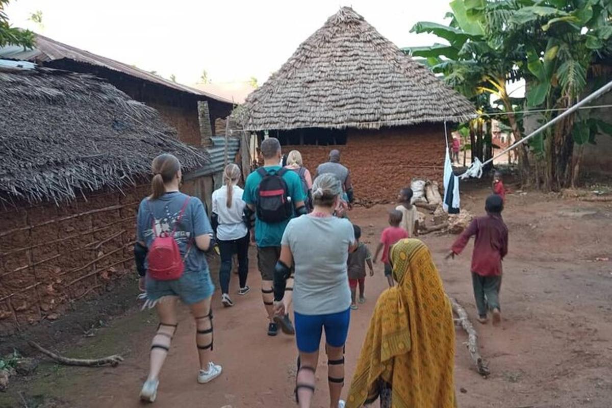 a group of people walking in front of a building