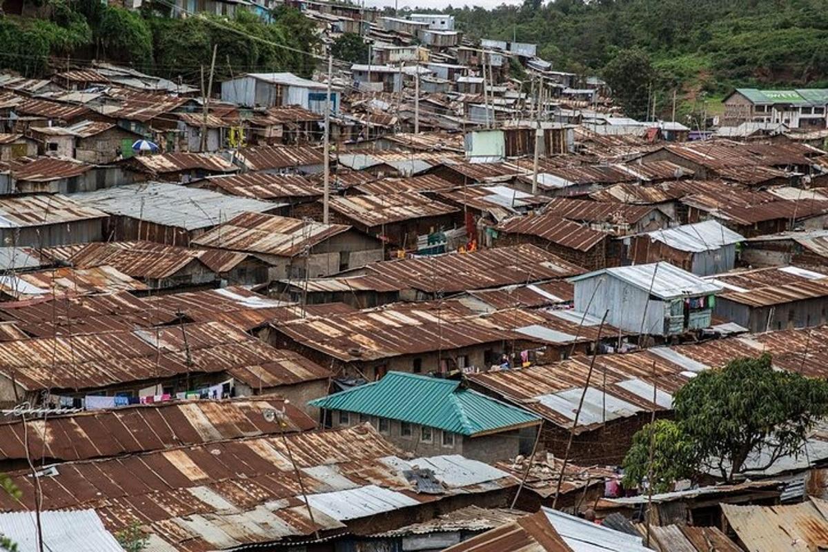 an overhead view of a city with many roofs