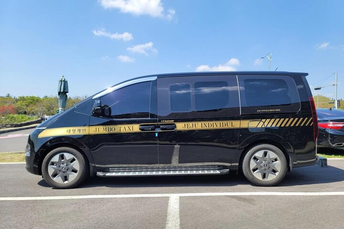 a black van parked in a parking lot