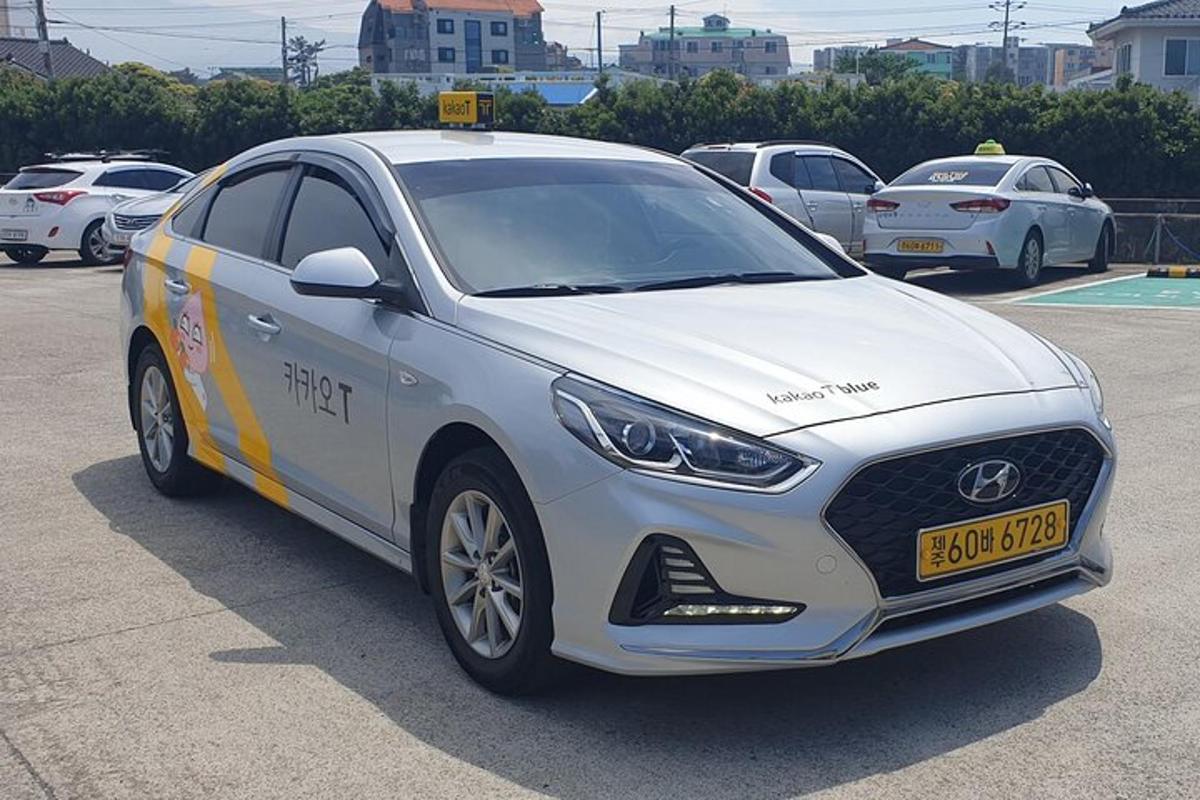 a white car parked in a parking lot