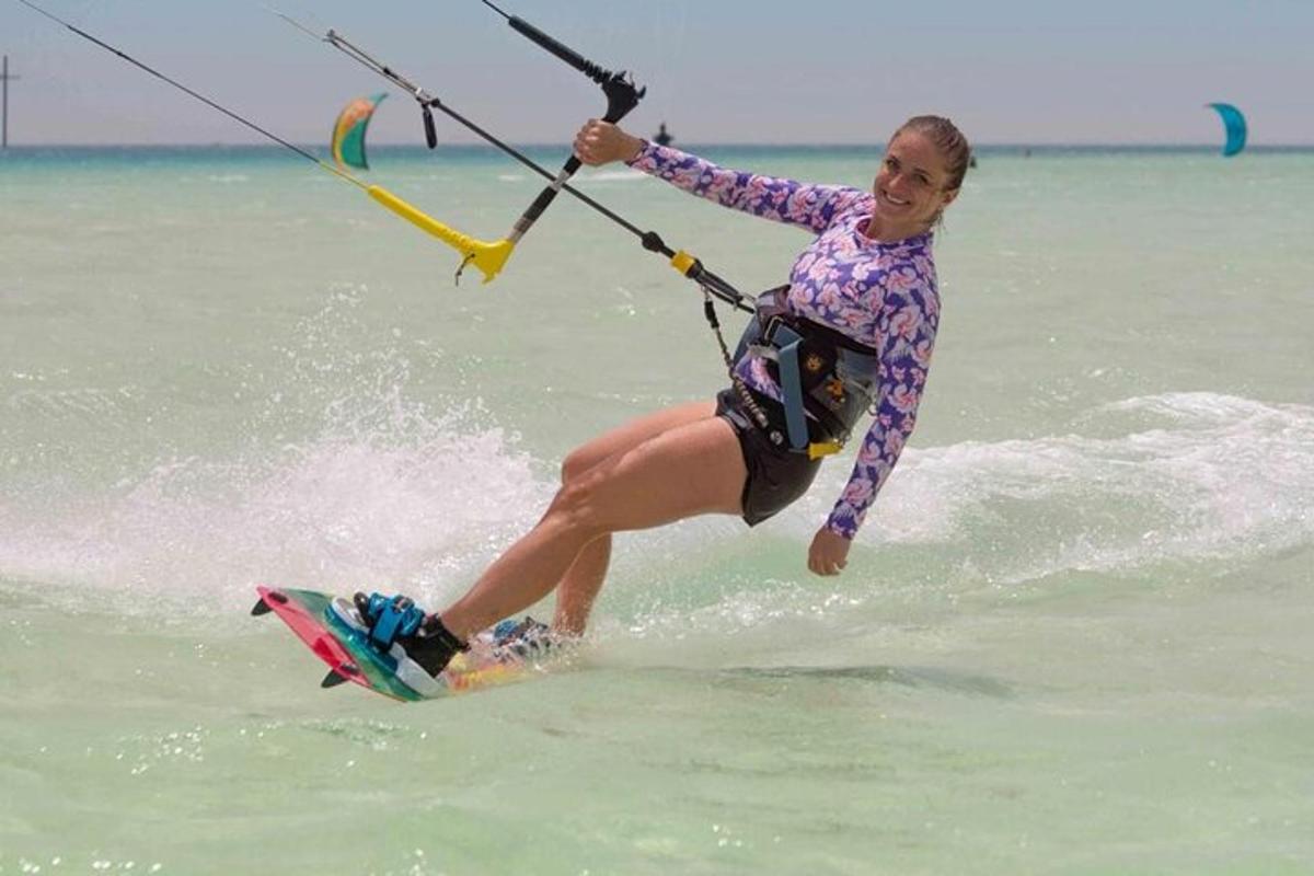 a woman on a surfboard in the water