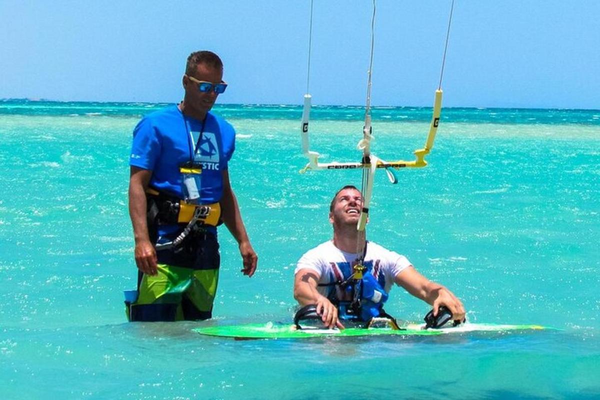 a man is on a surfboard in the ocean
