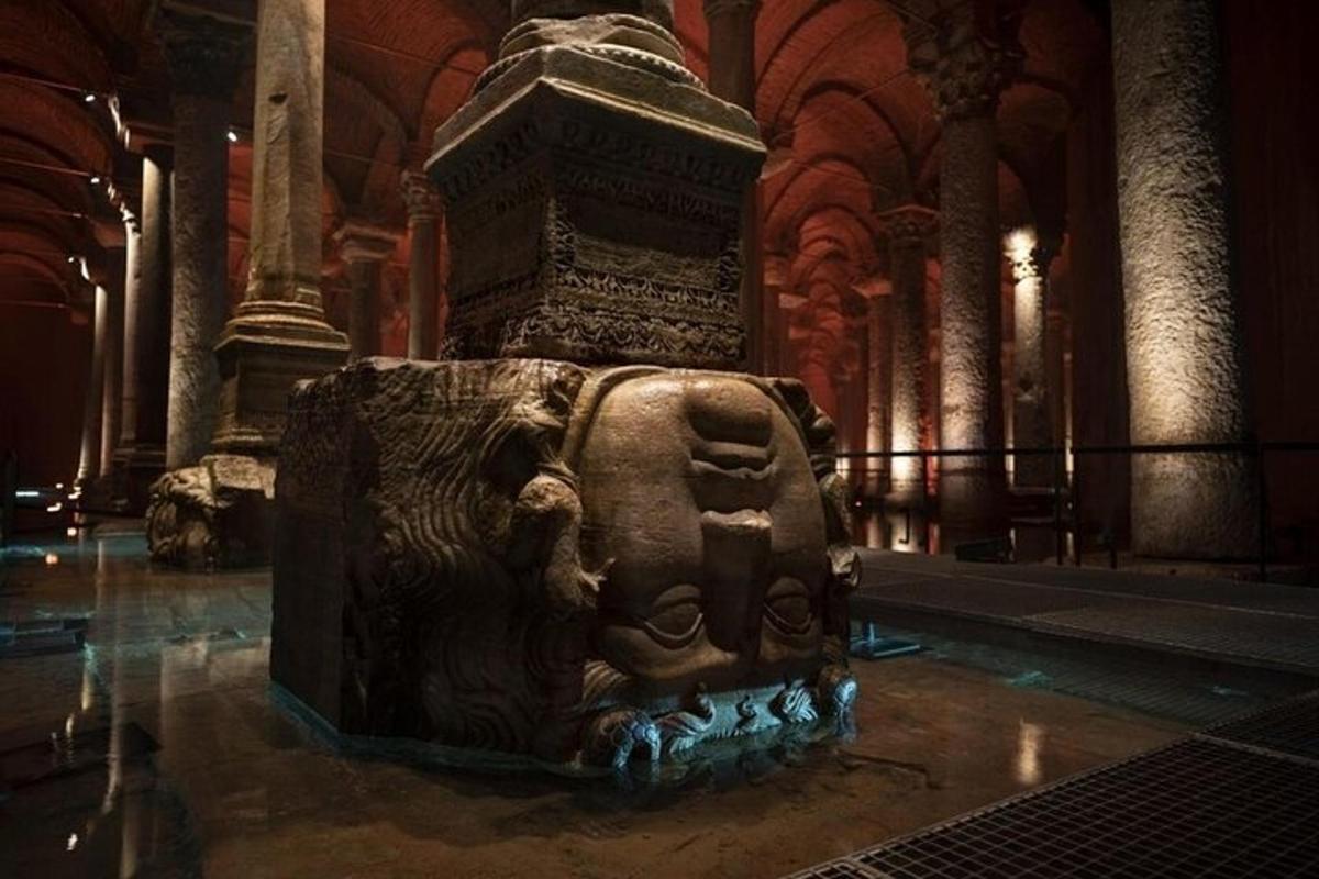 a stone statue in a room in a building
