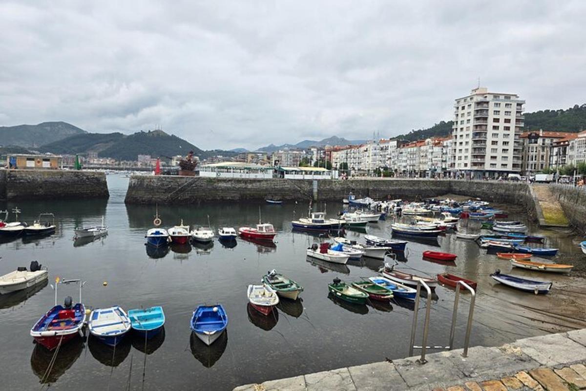 a group of boats are docked in a harbor