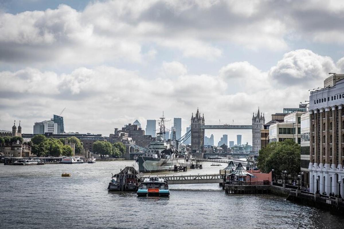 a view of a river with buildings and a bridge