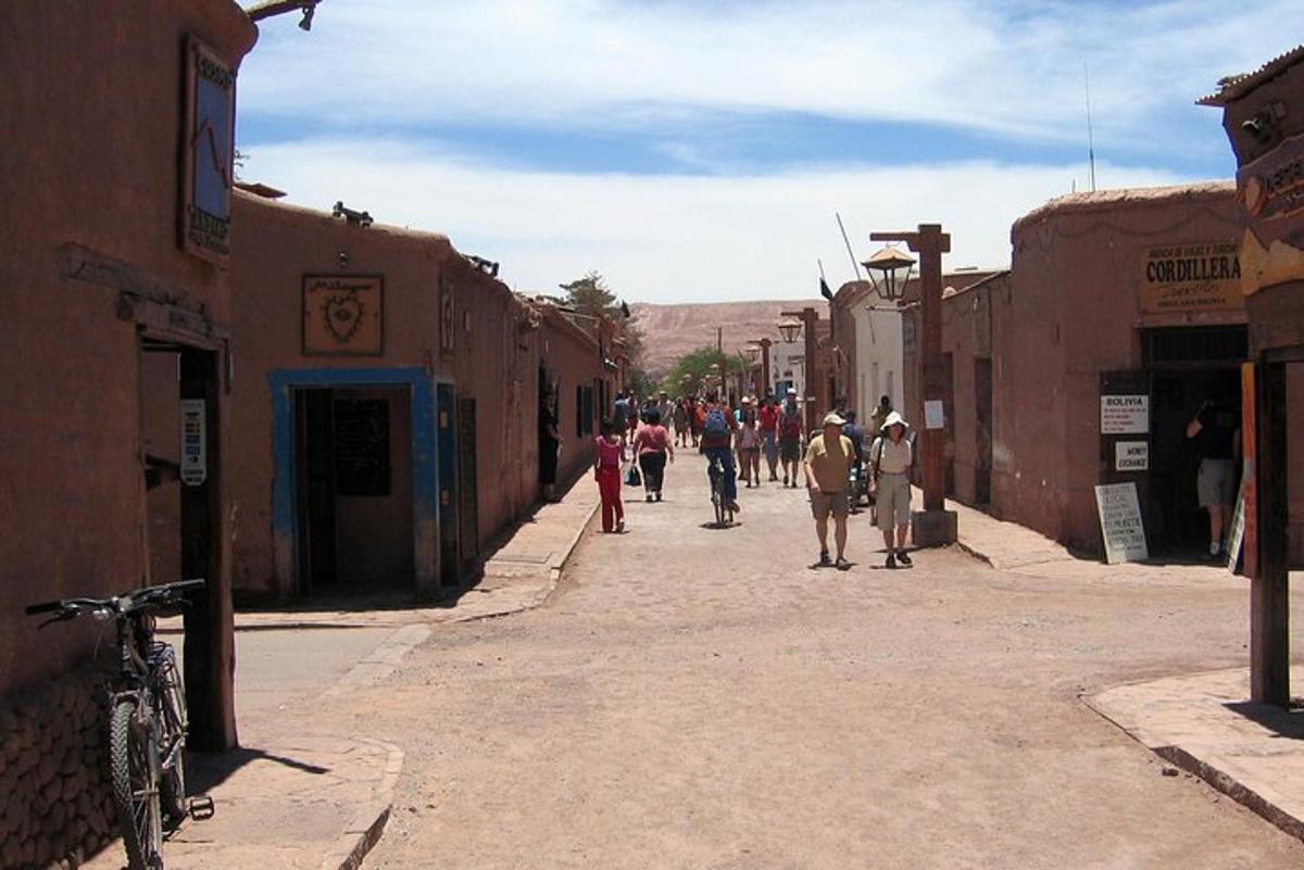a group of people walking down a street