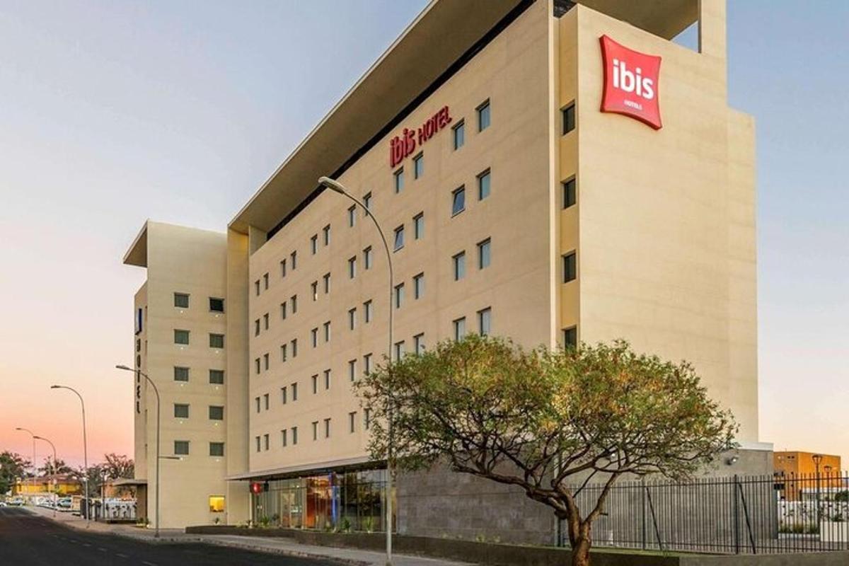 a building with a bus sign on the side of it