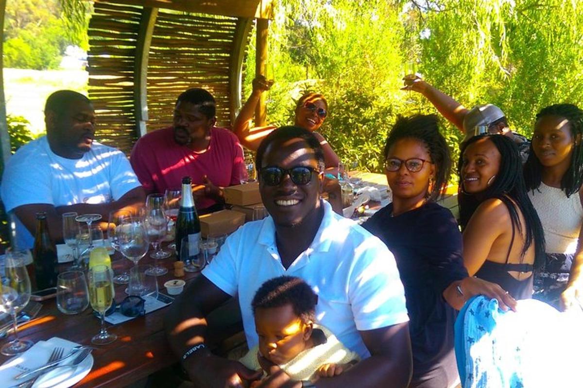 a group of people sitting at a table together
