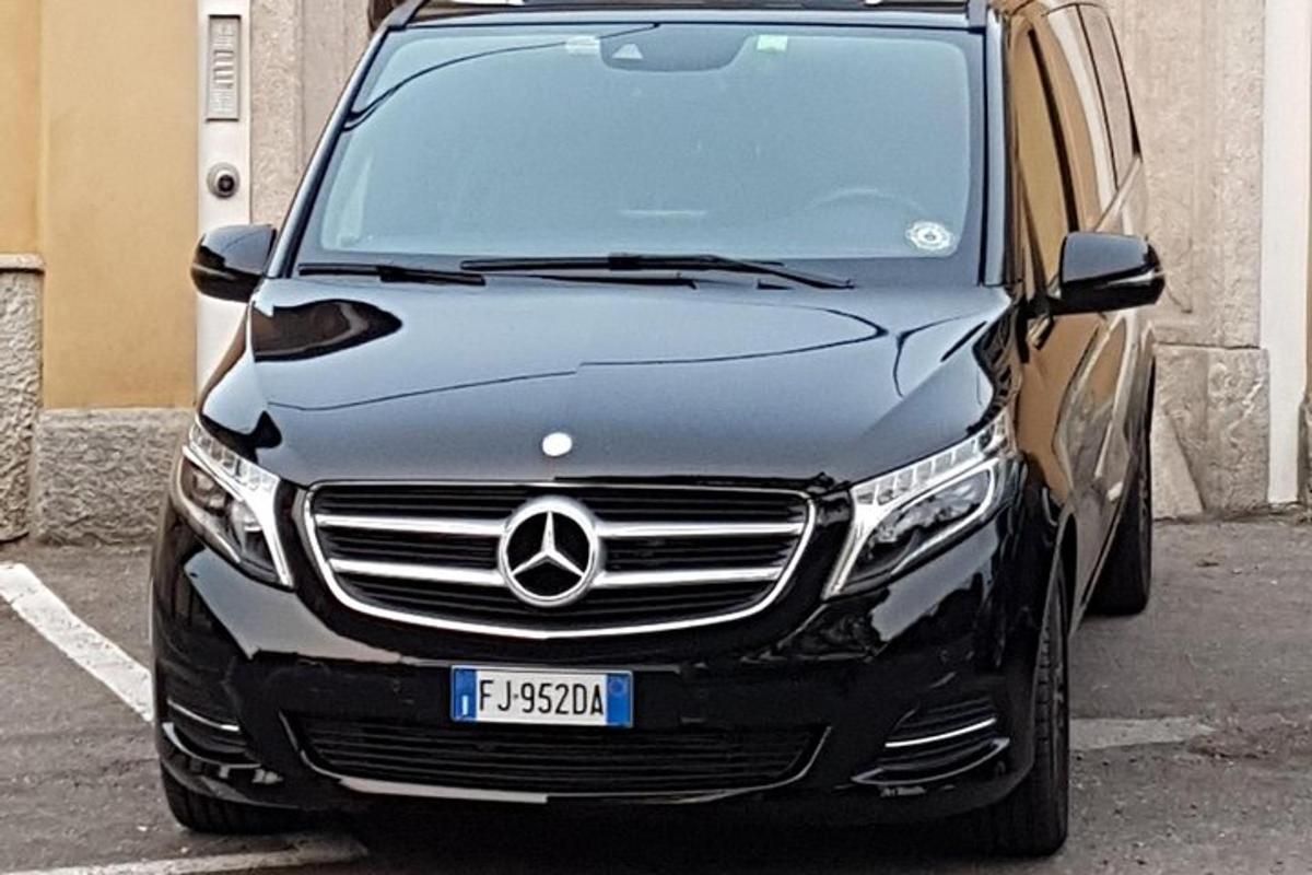 a black car parked in a parking lot