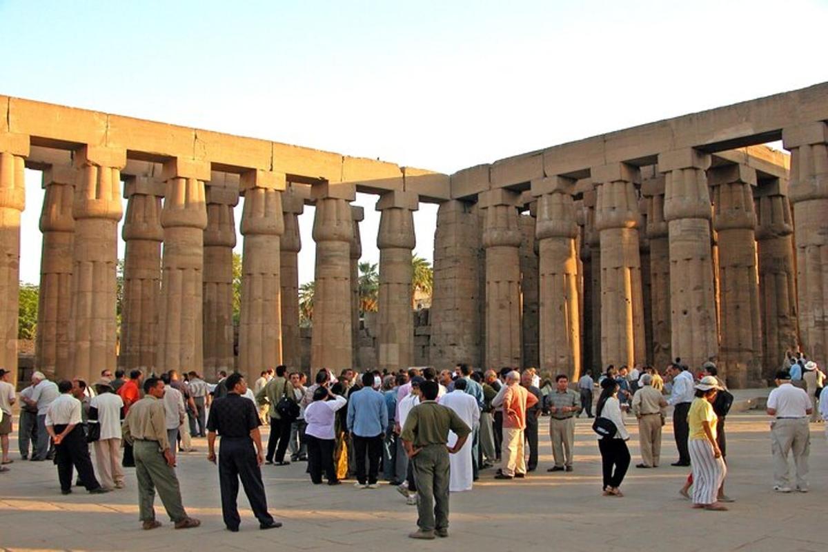 a large group of people standing in front of a building