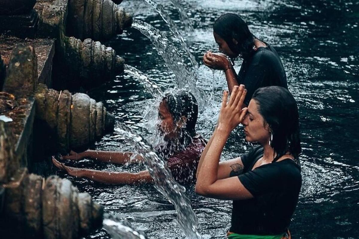 a group of people playing in the water