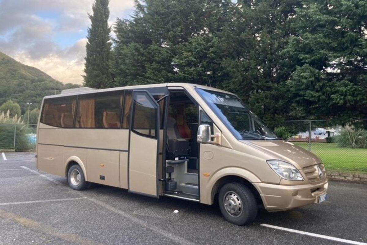 a small van parked in a parking lot