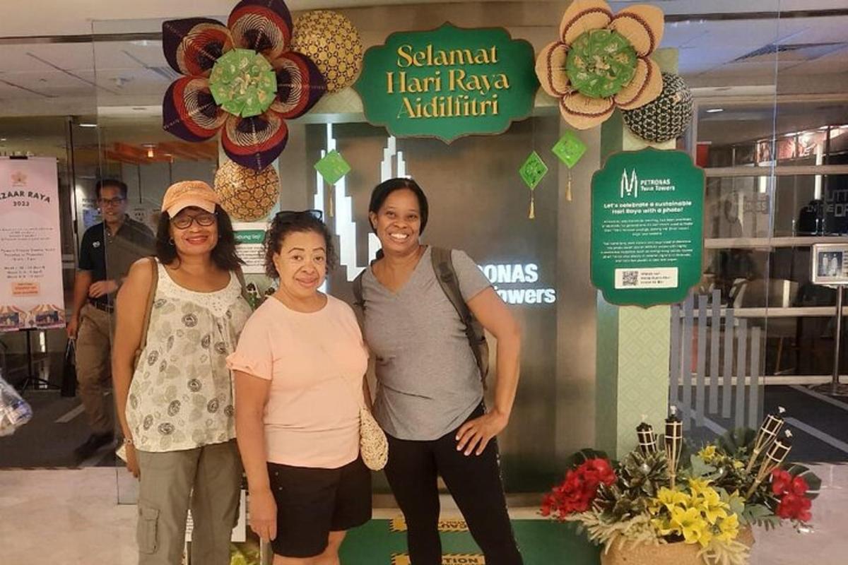 a group of three women standing in front of a store