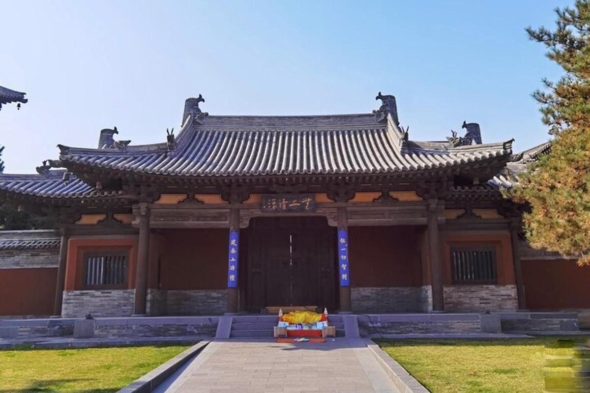 an asian style building with a table in front of it
