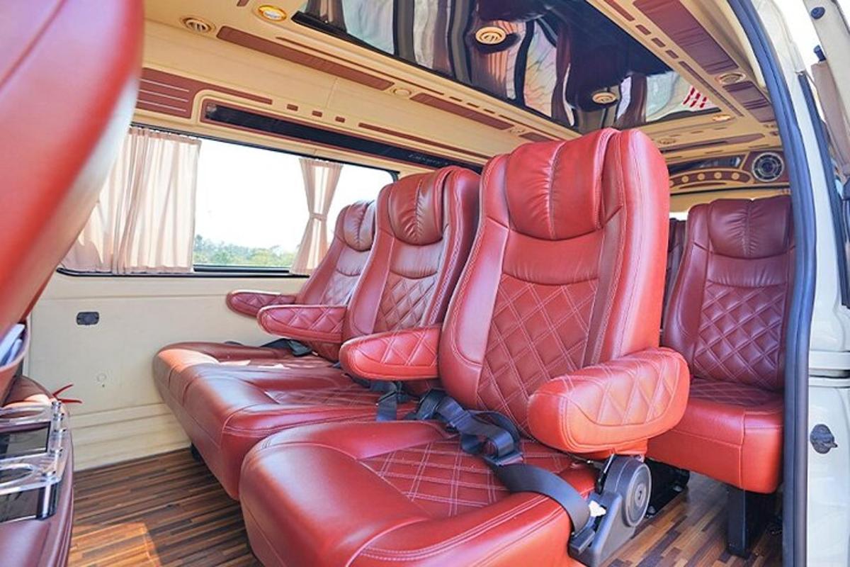 a group of red seats in the back of an rv