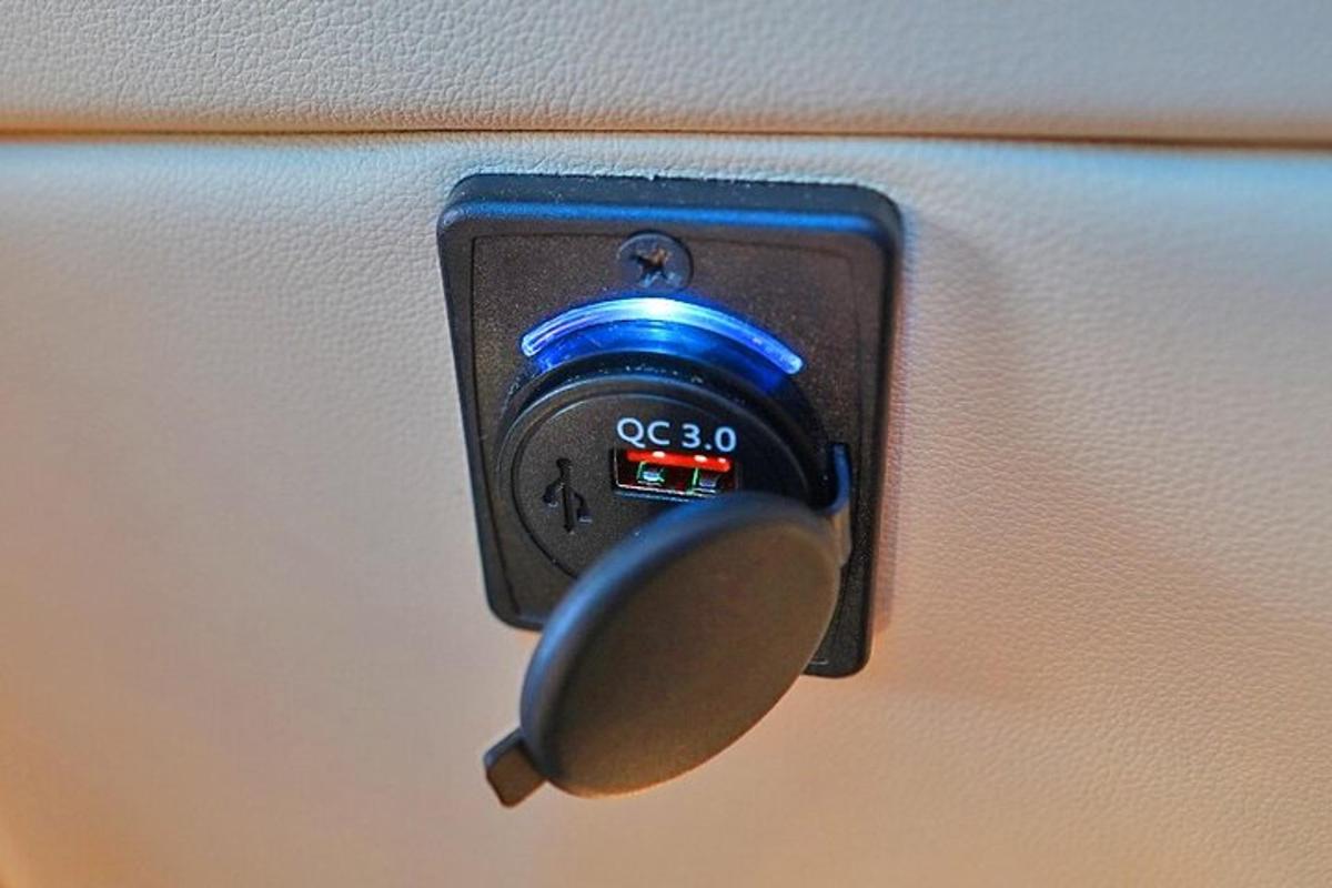 a close up of a button on a suitcase
